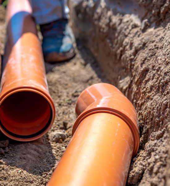 Laying,Drainage,Pipes,Into,The,Ground