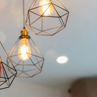 An,Electrician,Is,Installing,Spotlights,On,The,Ceiling.,Handyman,Choosing