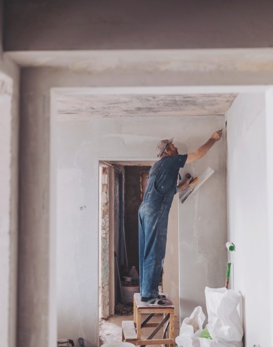 Construction,Worker,On,The,Construction,Site.,Wearing,Worker,Overall,With