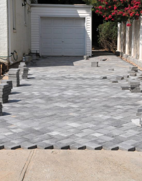 Aug.,,,:,Workers,Installing,New,Tile,Pavers,To,Home